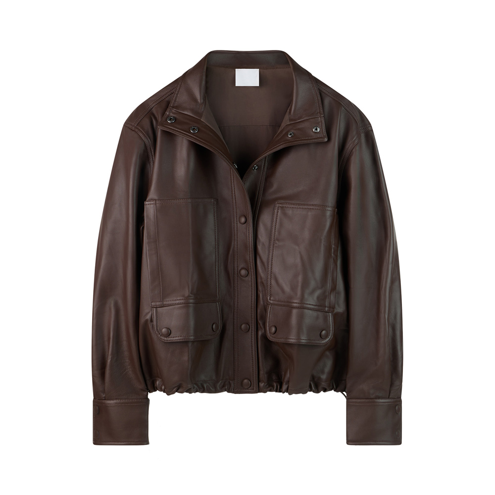 Brown leather jacket photographed hanging against a white background